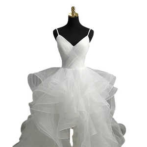Elegant white high-low wedding dress with V-neck straps and layered ruffle tulle skirt