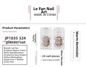 Detail of 24pcs French black heart press-on nails set with 1g glue in minimal box