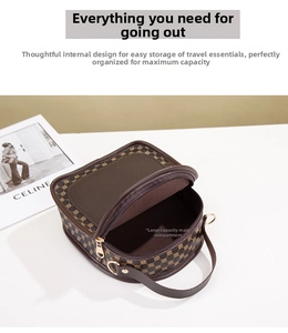 Macro view of vintage brown monogram circle bag showing spacious main compartment