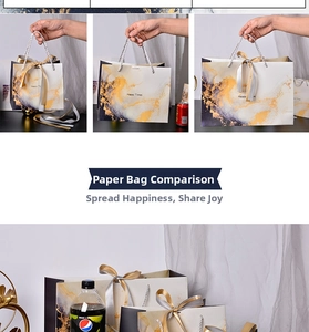 Three-piece marble pattern gift bag set with silk bows and white woven handles