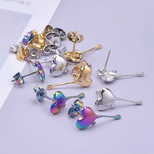 Polished heart-shaped stud earrings set in gold, silver, and rainbow steel colors