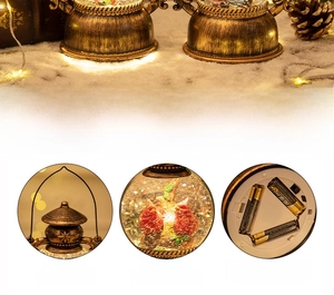 Detail showing vintage Christmas lantern battery compartment for 3 AA batteries