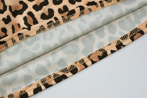 Close-up of leopard print fabric detail showing high-quality stitching and texture