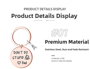 Macro detail of rose gold stainless steel keychain with engraved Dad charm and letter A