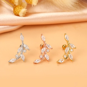 Three elegant leaf-shaped earrings in silver, rose gold, and gold with zircon stones
