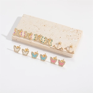Boucles d'oreilles papillon vintage en or avec émail coloré et pierres de zircon