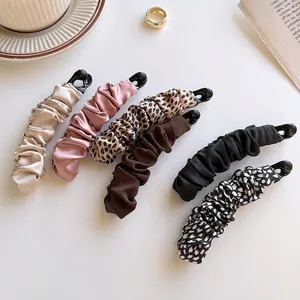 Set of large satin bow banana clips in solid colors and trendy leopard patterns