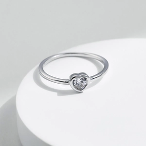 Minimalist S925 sterling silver ring featuring a sparkling heart-shaped moissanite stone