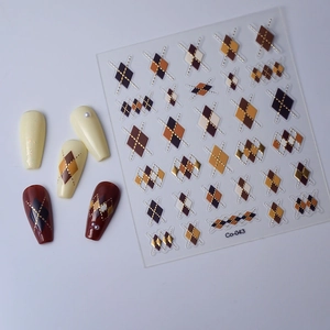 Detail of vintage brown plaid nail stickers with gold foil and embossed texture Co-043
