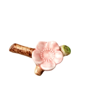 Elegant Japanese cherry blossom ceramic chopstick rest with pink flower on brown branch