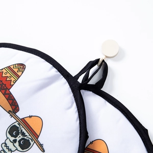 Insulated tortilla warmer bag with Day of the Dead skull print and black hanging loop