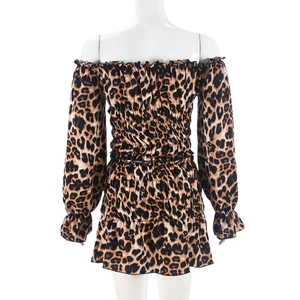 Detailed back view of leopard print off-shoulder dress featuring elastic pleated textures