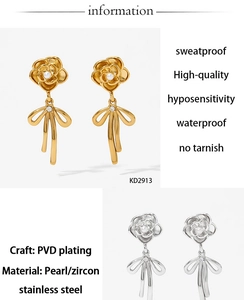 Detail of PVD plated stainless steel flower bow earrings with pearls and zircons