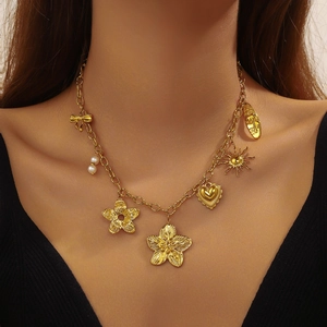 Gold-plated stainless steel chain necklace featuring flower, sun, heart and pearl charms