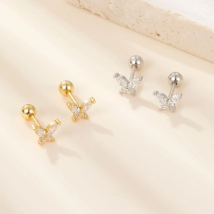 Macro view of butterfly earrings with sparkling cubic zirconia and screw back closures