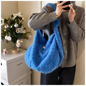 Detail shot of Klein blue fleece tote bag with soft texture and large capacity