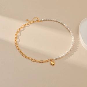 French style pearl necklace with gold paperclip chain and heart-shaped pendant