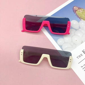 Retro rectangle kids sunglasses in pink and off-white frames with gray lenses