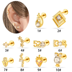 Set of 10 gold titanium piercing studs featuring geometric shapes and crystal inlays