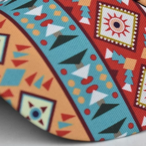 Macro shot of colorful geometric Aztec pattern on premium twill fabric ponytail hat