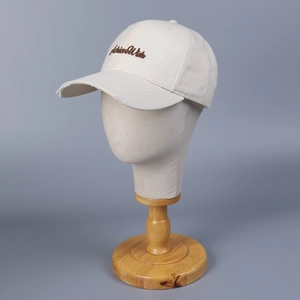 Beige vintage cotton baseball cap with AchieveWish embroidery and distressed brim