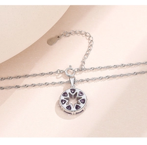 Detailed close-up showing the S925 hallmark on silver necklace with purple zircon pendant