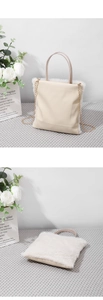 Detail of beige faux fur crossbody bag with PU leather handles and golden metal chain strap