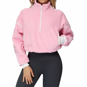 Women's pink polar fleece running jacket with high collar and white contrast piping detail
