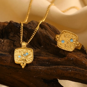 18K gold plated celestial jewelry set with sun moon star patterns and blue gemstones