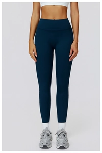 Detailed close-up showing the high waist design and fabric of navy blue yoga pants