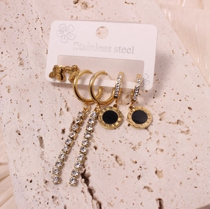 Three-piece set of gold stainless steel earrings with butterfly and roman numeral charms