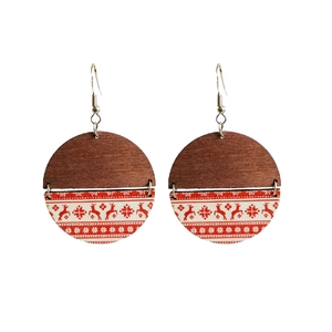 Bohemian Christmas round earrings with reindeer and snowflake pattern on wooden texture