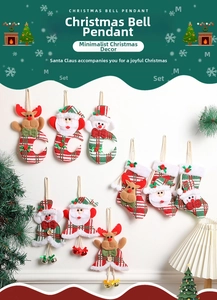Detail view of festive Christmas bells and socks featuring Santa and reindeer designs