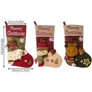 Detailed dimensions of Christmas stockings featuring Santa, Snowman, and Reindeer motifs