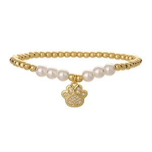 Elegant gold bead and pearl bracelet with a sparkling crystal cat paw charm on white background