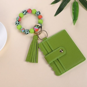 Green silicone beaded bracelet keychain with leopard print card holder and PU tassel