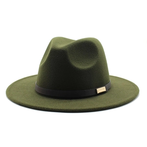 Detailed close-up of dark green wool felt fedora with black band and gold buckle accent