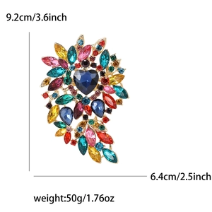 Golden alloy floral brooch with blue heart stone and multicolor crystals, 9.2cm height