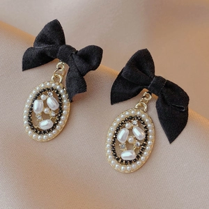 Vintage gold bow earrings with black velvet, faux pearls and rhinestones for women