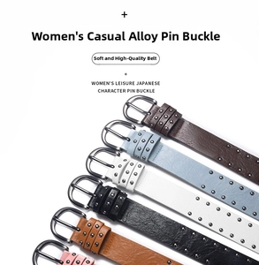 Detailed view of punk style punk rivets on multiple colored leather belts for women