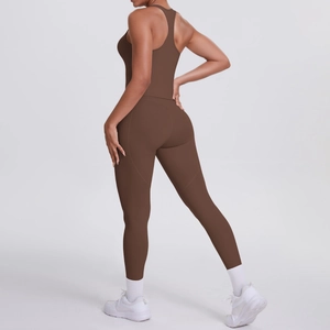 Detail view of the chocolate brown racerback sports bra and high-waisted yoga leggings