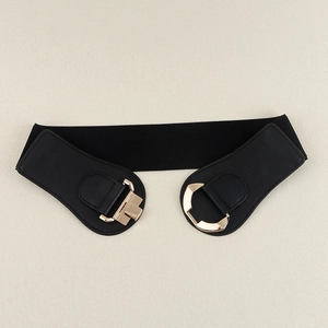 Close-up of black elastic waist belt with PU leather ends and gold geometric buckle