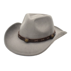 Detail of light gray felt cowboy hat with brown leather band and gold metal studs