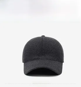 Detailed front view of a stylish warm dark gray textured wool baseball cap for men