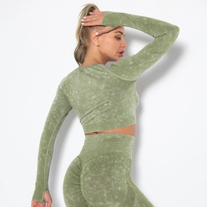 Detail of washed green seamless yoga set featuring thumb holes and scrunch butt design