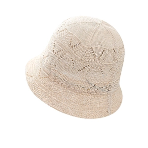 Beige hollow knit bucket hat with elegant cross floral texture for summer sun protection