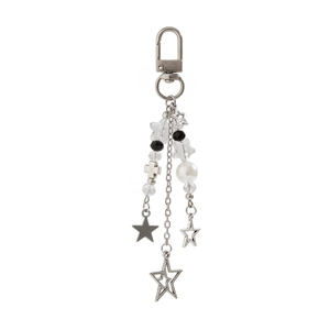 Detail view of silver keychain with star pendants and transparent glass bead charms