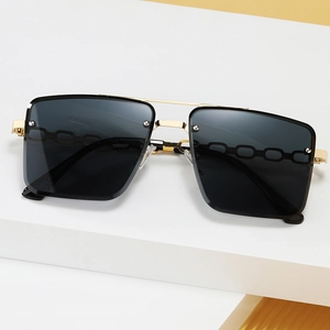 Fashionable rimless square sunglasses with black lenses and gold frames for UV protection
