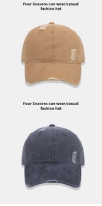 Close-up of distressed cotton baseball caps in khaki and dark grey with ripped details