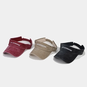 Adjustable sun visor hats with washed fabric and embroidered Not Interested slogan